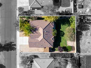 Aerial view of property and surrounding area featuring property boundaries highlighted