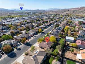 Aerial perspective of suburban area featuring mountains