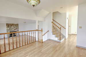 Hallway with light wood finished floors
