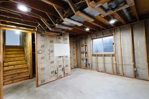 Below grade area featuring stairway