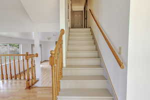 Stairway with wood finished floors