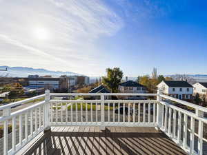 Wooden deck featuring a mountain view