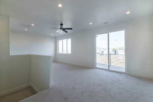 Spare room with carpet flooring, recessed lighting, and a ceiling fan