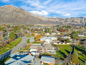View of property location with nearby suburban area and mountains