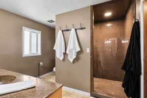 Master Bathroom with vanity, a walk in shower