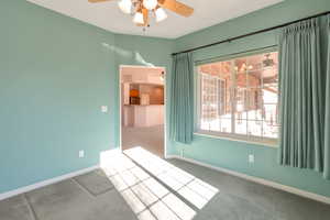 Spare room featuring carpet