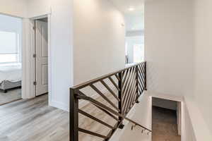 Staircase featuring baseboards