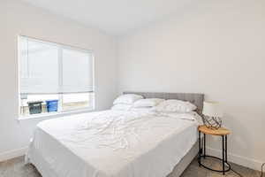 Bedroom with carpet flooring