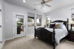 Bedroom 3 with light colored carpet, access to outside, a ceiling fan, and recessed lighting. Each room has it's own walk-in closet
