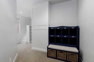 Mudroom with carpet and recessed lighting