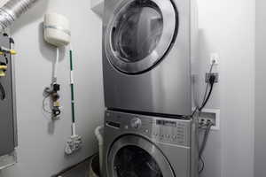 Washroom with stacked washer / drying machine