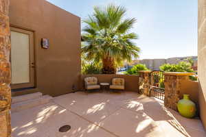 View of patio / terrace and separate entrance to bedroom 2.