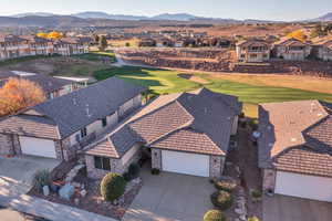 Aerial view of residential area with a mountain backdrop