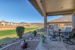 View of patio featuring a residential view and outdoor dining space