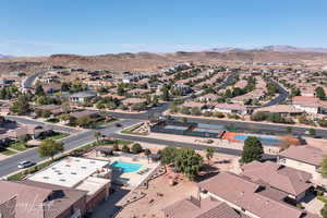 Aerial perspective of suburban area with a mountain backdrop