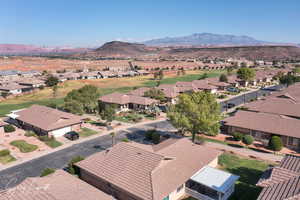 Aerial view of residential area with mountains