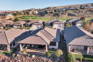 Aerial view of residential area featuring a local golf course