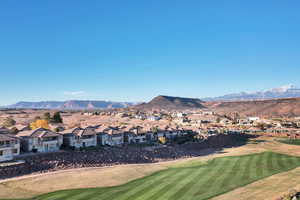 Mountain view with nearby suburban area and a local golf course
