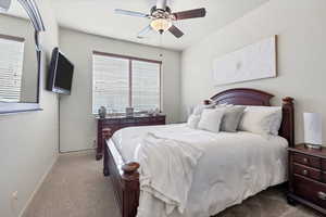 Bedroom featuring carpet floors and ceiling fan