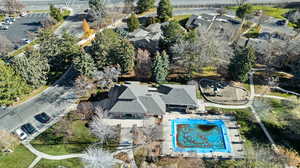 Aerial overview of property's location featuring a pool area