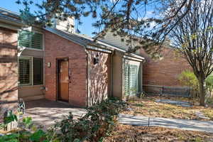 View of home's exterior featuring brick siding