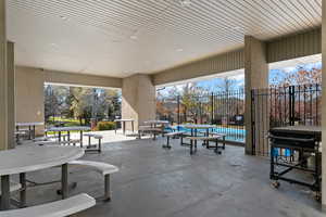 View of patio / terrace featuring area for grilling and an outdoor pool