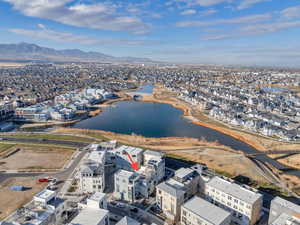 Aerial view of residential area featuring a water and mountain view
