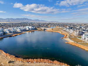 Aerial perspective of suburban area featuring a water and mountain view