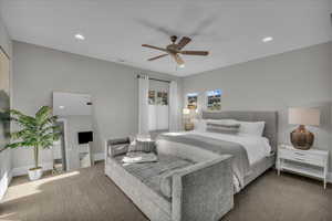 Bedroom featuring recessed lighting, carpet flooring, and a ceiling fan