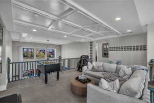 Living room featuring recessed lighting, coffered ceiling, carpet floors, and beamed ceiling