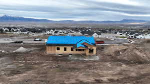 Aerial view of residential area with a mountain backdrop