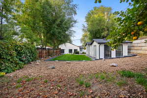 View of fenced backyard