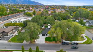 Aerial view of residential area featuring mountains
