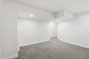 Basement featuring recessed lighting and carpet floors