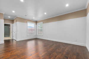 Unfurnished room with crown molding, dark wood-style flooring, and recessed lighting