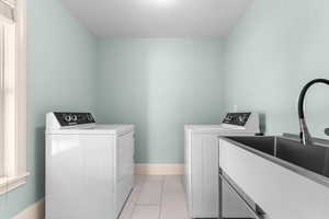 Laundry room featuring washer and dryer