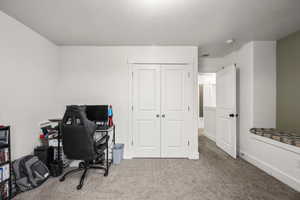 Office area with carpet floors and baseboards