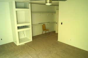 Unfurnished bedroom with a closet and carpet flooring