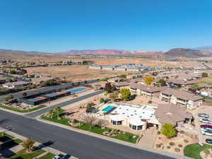 Aerial perspective of suburban area featuring a mountain backdrop