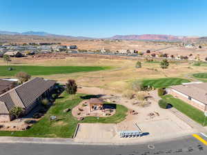 Aerial view of residential area featuring mountains