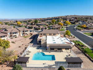 Aerial perspective of suburban area with a pool area