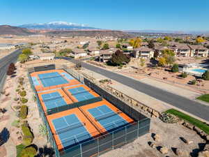 Aerial view of residential area featuring mountains