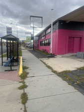 View of property exterior with concrete block siding