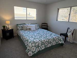 Main Bedroom featuring light carpet, recessed and multiple windows to draw in the warm natural sunlight