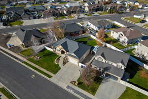 Aerial overview of property's location with nearby suburban area