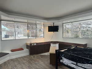 Bedroom featuring dark wood-type flooring