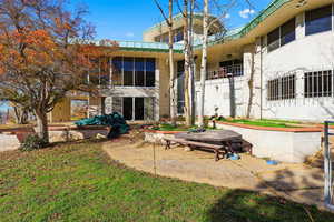 View of home's community featuring a patio