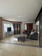 Living area with light wood-type flooring