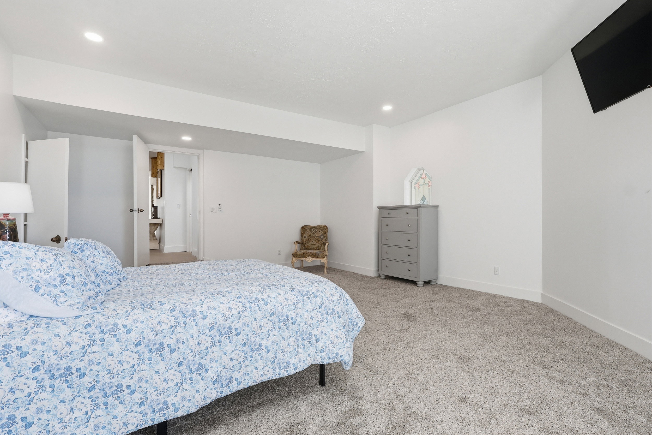 Carpeted bedroom featuring baseboards and recessed lighting