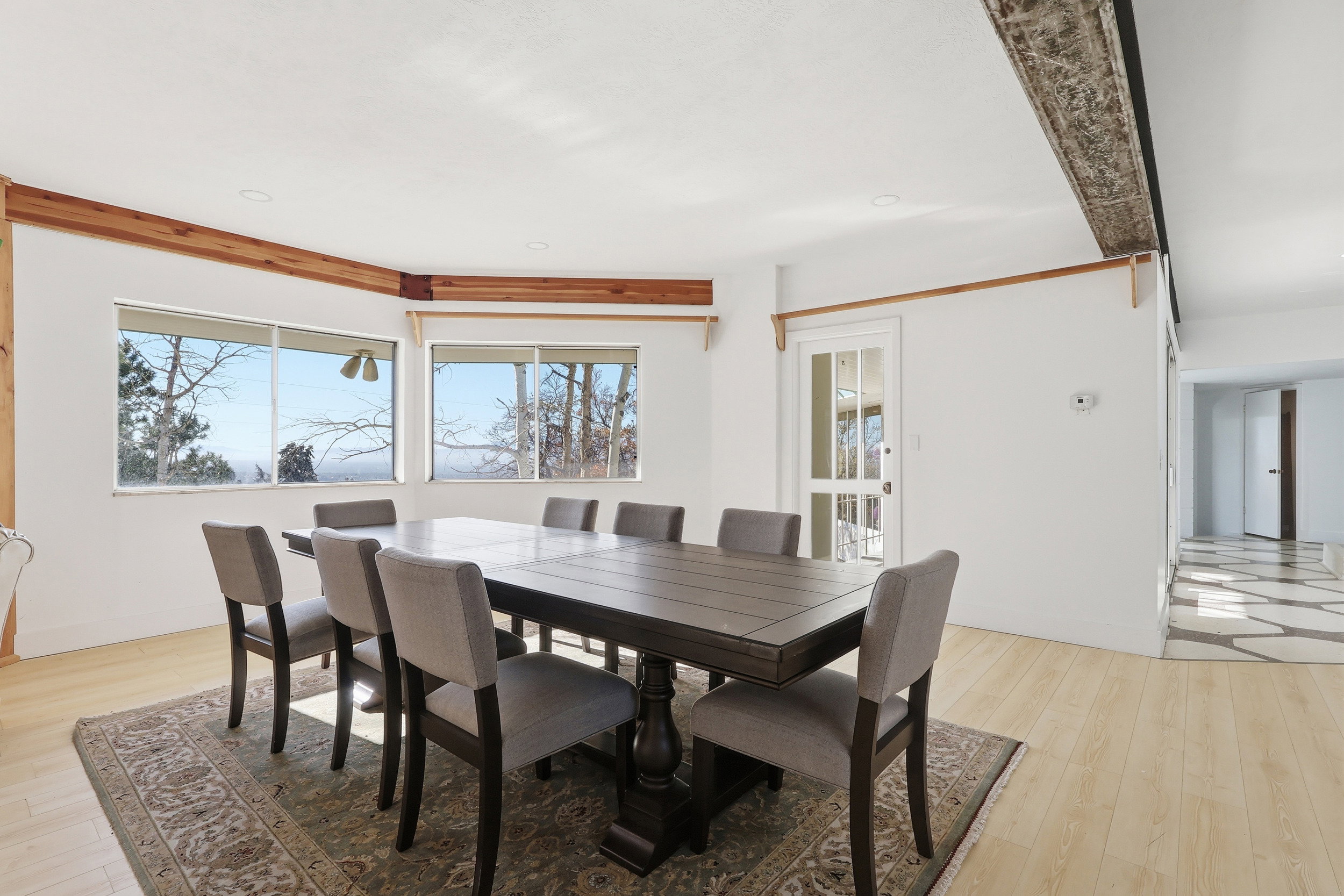 Dining area with light wood-style flooring